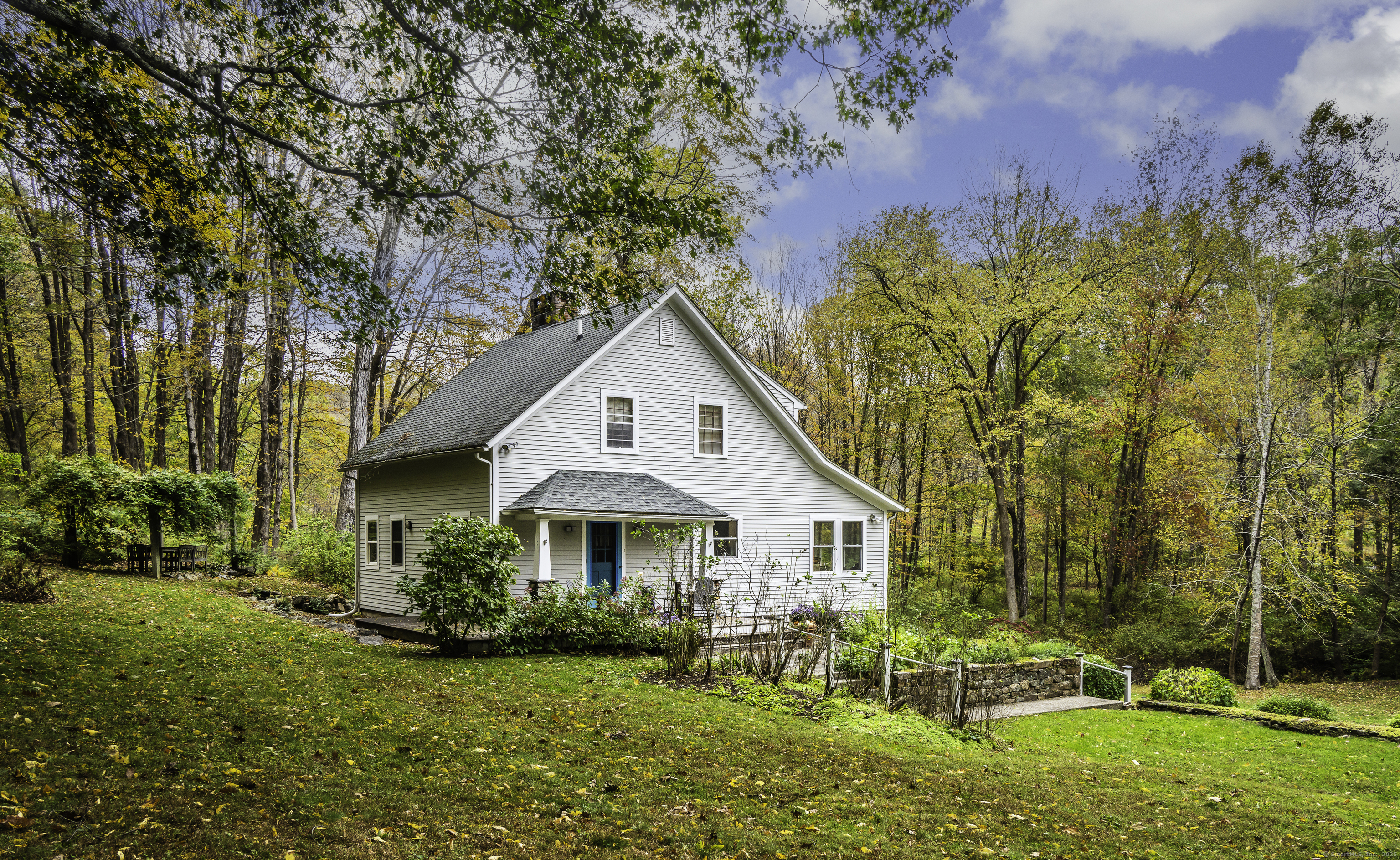 103 Geer Mountain Road South Kent, CT 06785 - Photo 4 of 36 a view of a house with backyard and sitting area