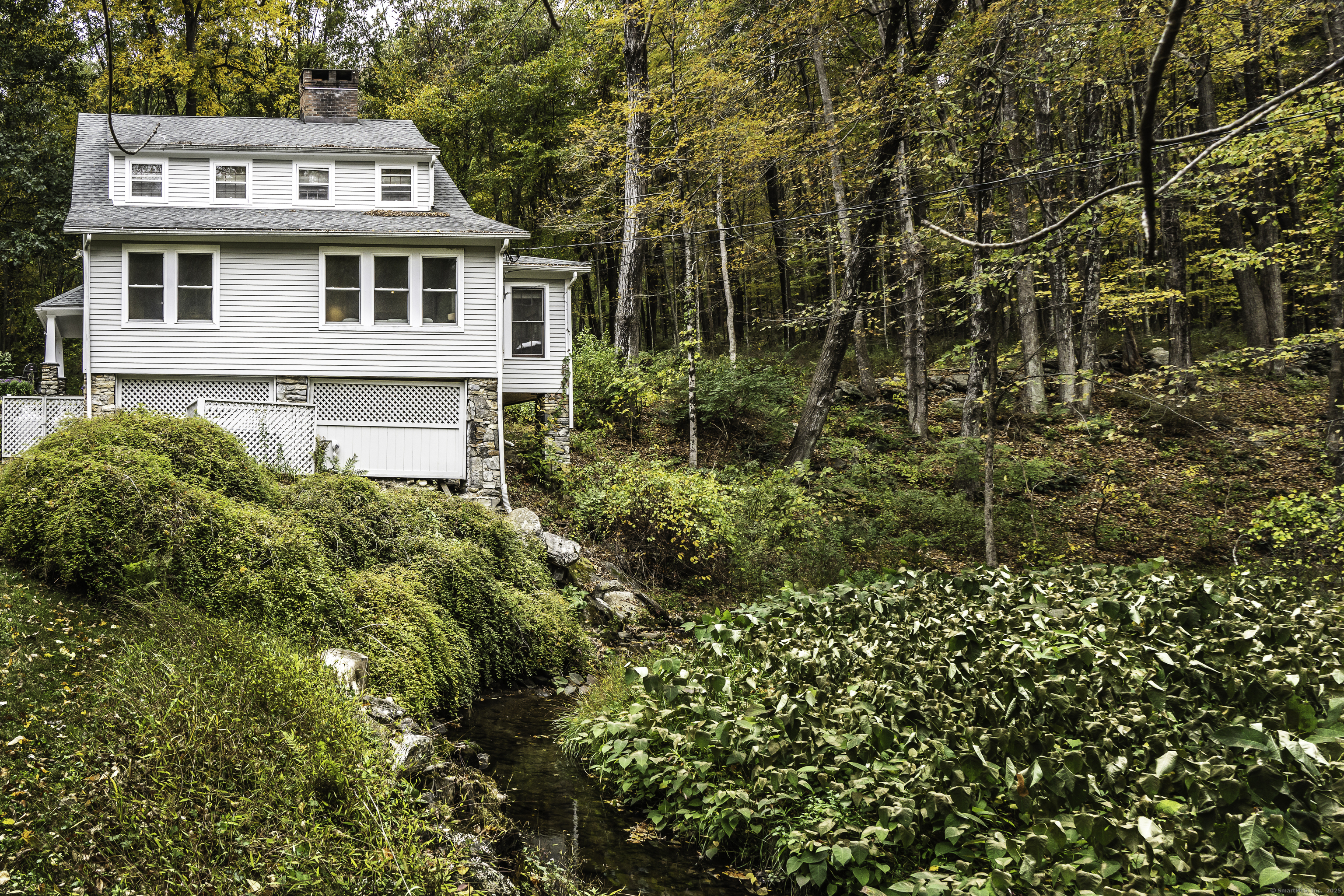 103 Geer Mountain Road South Kent, CT 06785 - Photo 6 of 36 a view of a back yard of the house