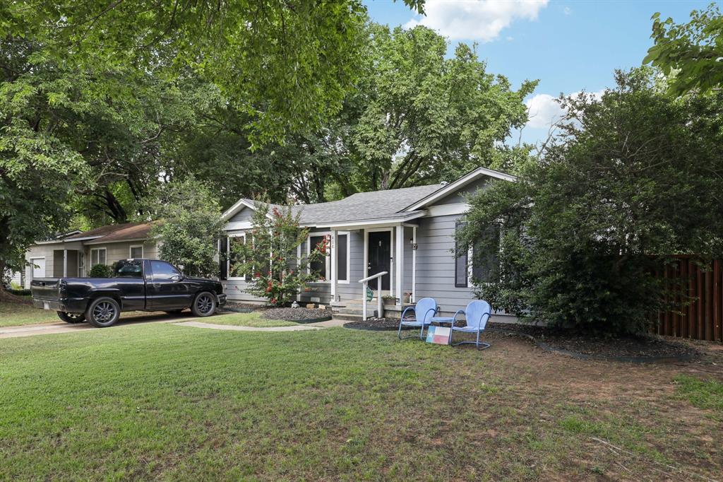 408 Harrison Lane Hurst, TX 76053 - Photo 3 of 15 a view of a house with backyard and sitting area