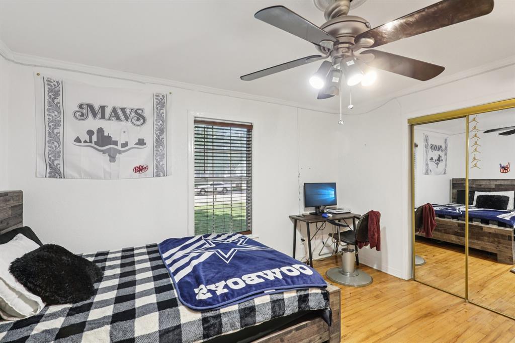 408 Harrison Lane Hurst, TX 76053 - Photo 10 of 15 a bedroom with furniture and a window