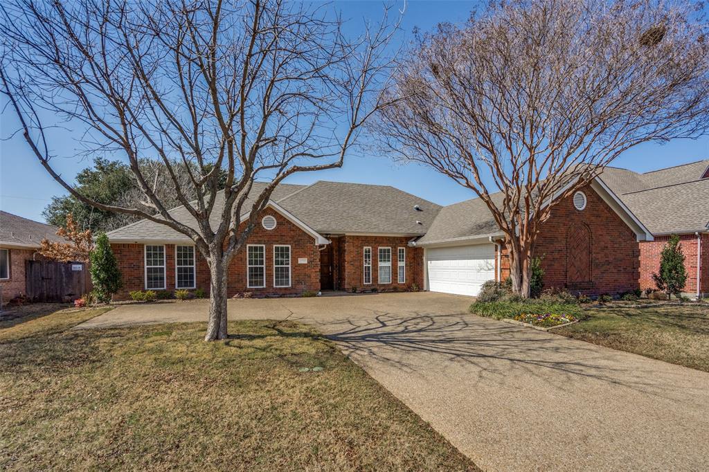 6604 Villa Road Dallas, TX 75252 - Photo 1 of 28 a front view of a house with a yard covered in snow