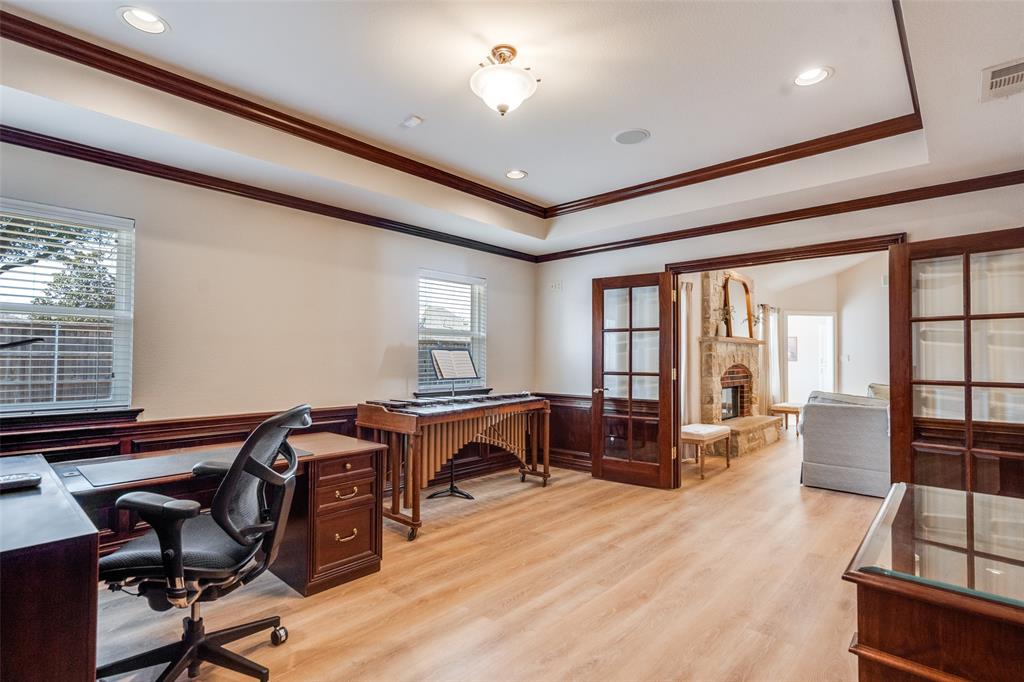6604 Villa Road Dallas, TX 75252 - Photo 15 of 28 a view of a workspace with furniture and a window