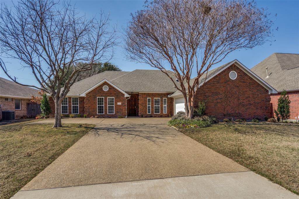 6604 Villa Road Dallas, TX 75252 - Photo 2 of 28 a front view of a house with a yard