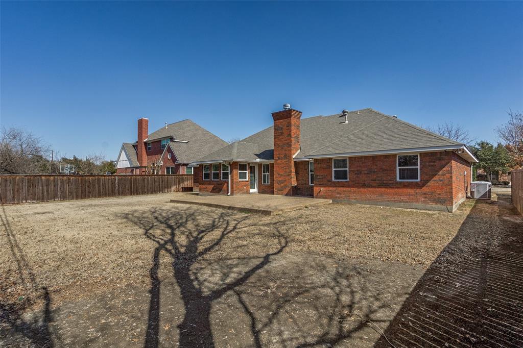 6604 Villa Road Dallas, TX 75252 - Photo 28 of 28 a front view of a house with a yard