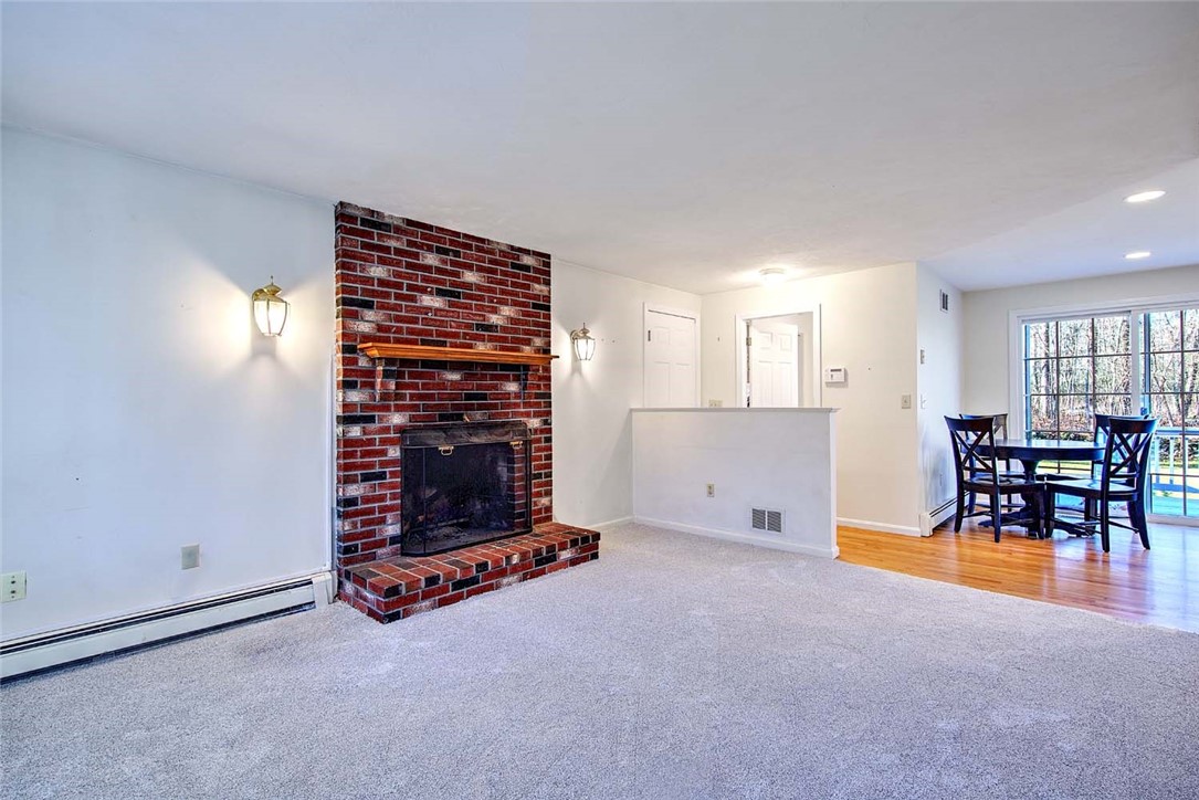 165 Bungy Road Scituate, RI 02857 - Photo 17 of 50 Living room looking into eat-in kitchen