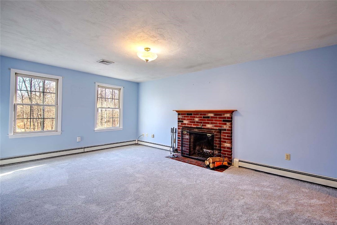 165 Bungy Road Scituate, RI 02857 - Photo 31 of 50 Fireplace in owners suite