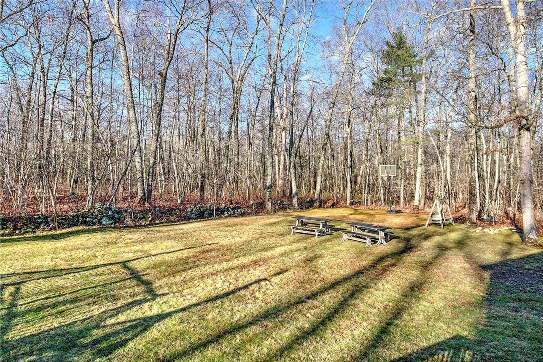 165 Bungy Road Scituate, RI 02857 - Photo 45 of 50 Backyard with picnic tables and basketball area