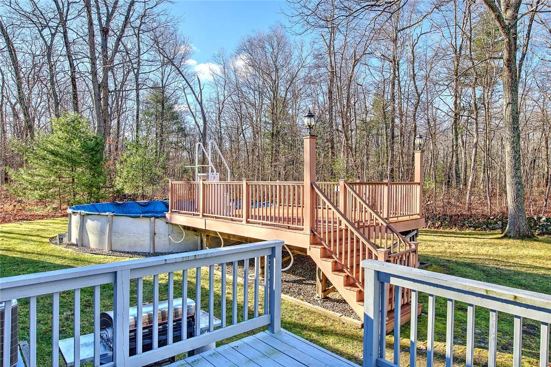 165 Bungy Road Scituate, RI 02857 - Photo 46 of 50 Backyard above ground pool with deck