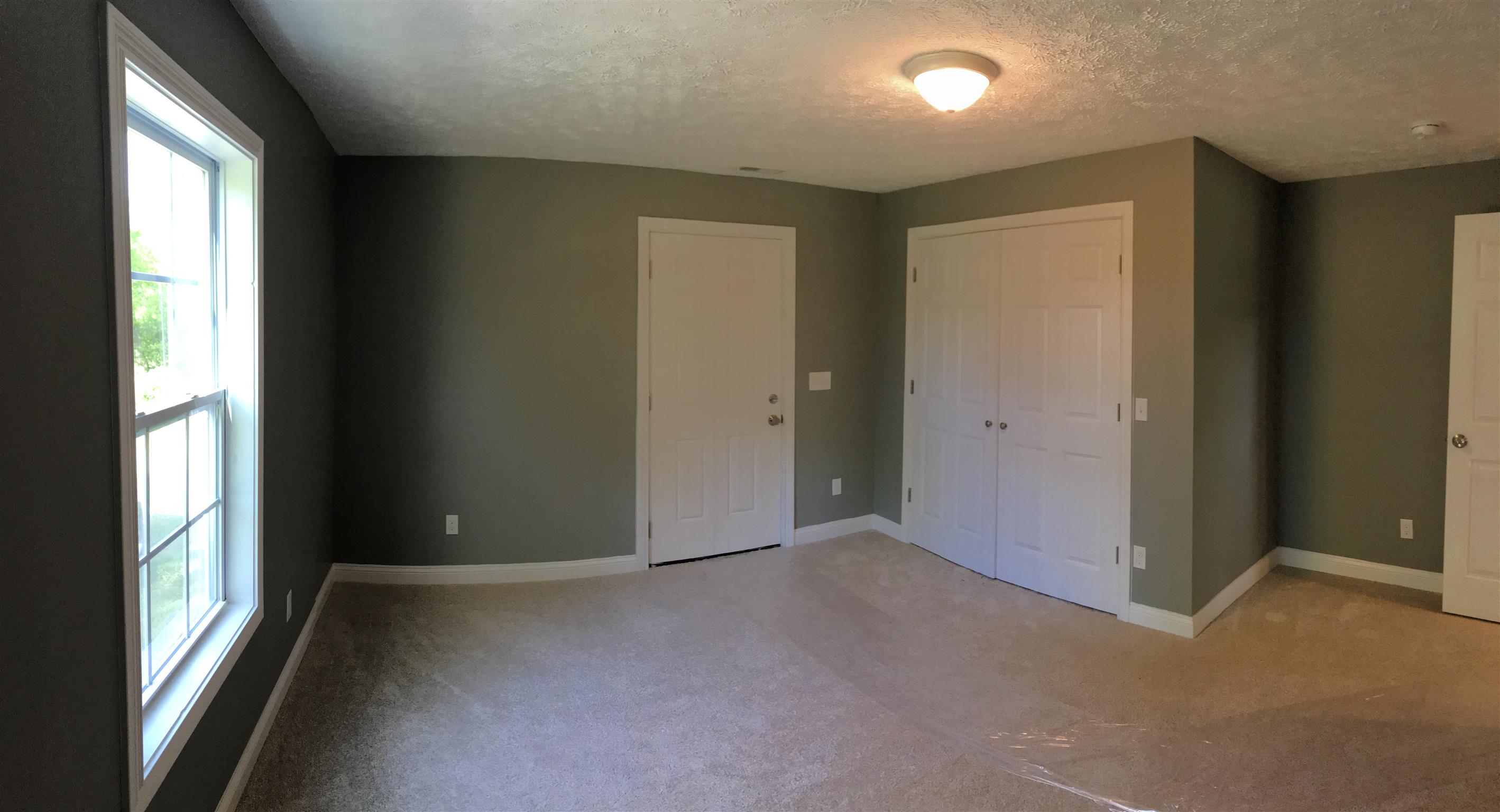 1114 Jakes Road Murfreesboro, TN 37127 - Photo 22 of 22 Bedroom three has walk in closet and leads out to the deck on the back of the home
