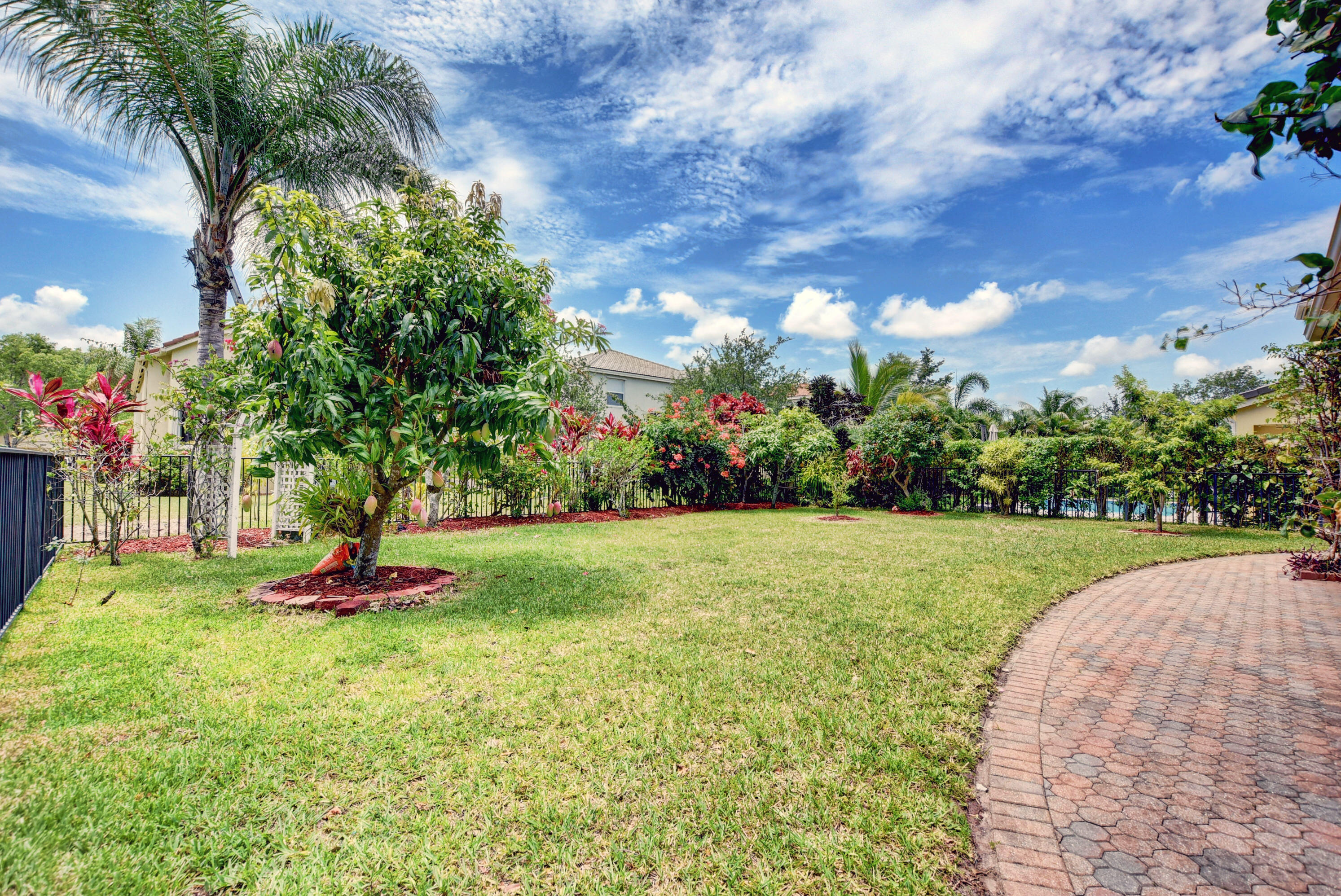 9744 Roche Place Wellington, FL 33414 - Photo 32 of 46 View of backyard