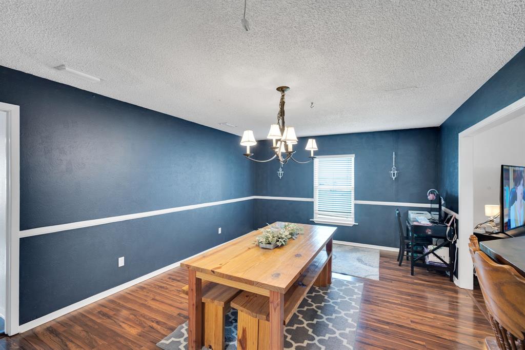430 Carter Road Italy, TX 76651 - Photo 31 of 36 a room with furniture and wooden floor