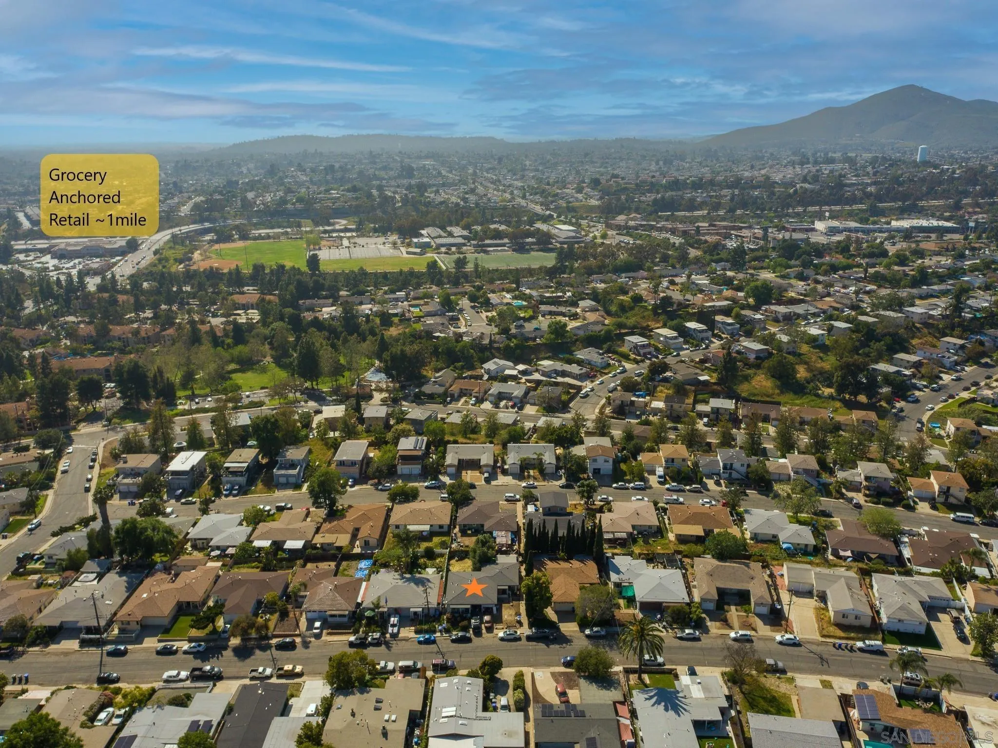 6060 Nancy Drive La Mesa, CA 91942 - Photo 9 of 9 an aerial view of residential houses with outdoor space and trees