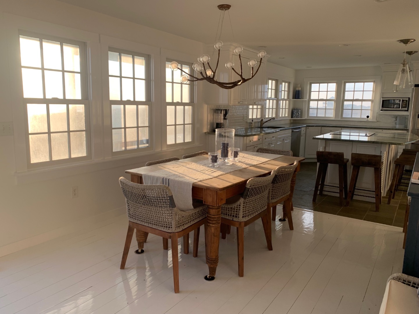 22 Sheep Pond Road Nantucket, MA 02554 - Photo 11 of 27 a view of a dining room with furniture window and outside view