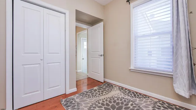 a view of an empty room and window