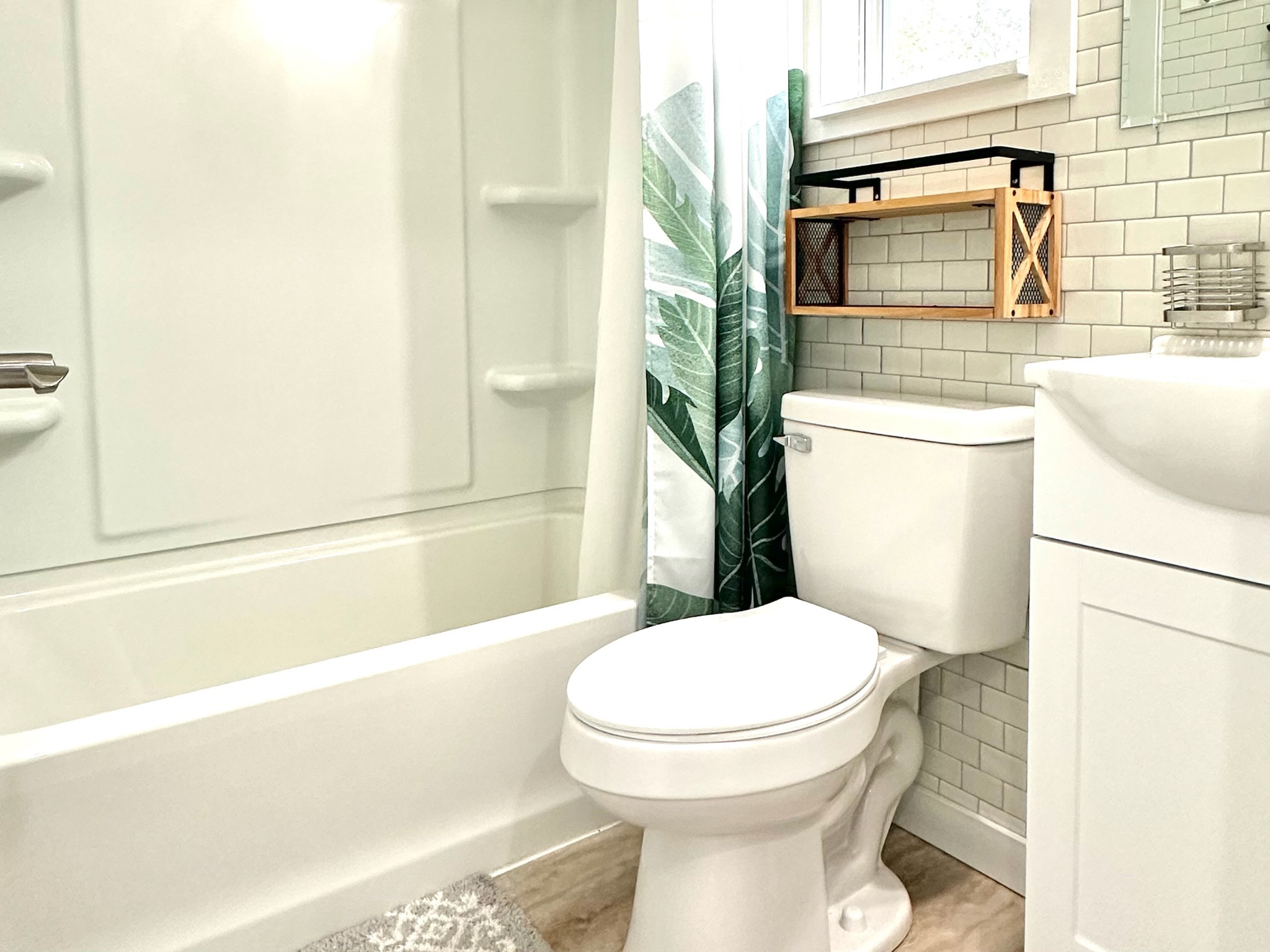 92-2083 Kailua Boulevard Ocean View, HI 96704 - Photo 20 of 30 a bathroom with a toilet and a shower