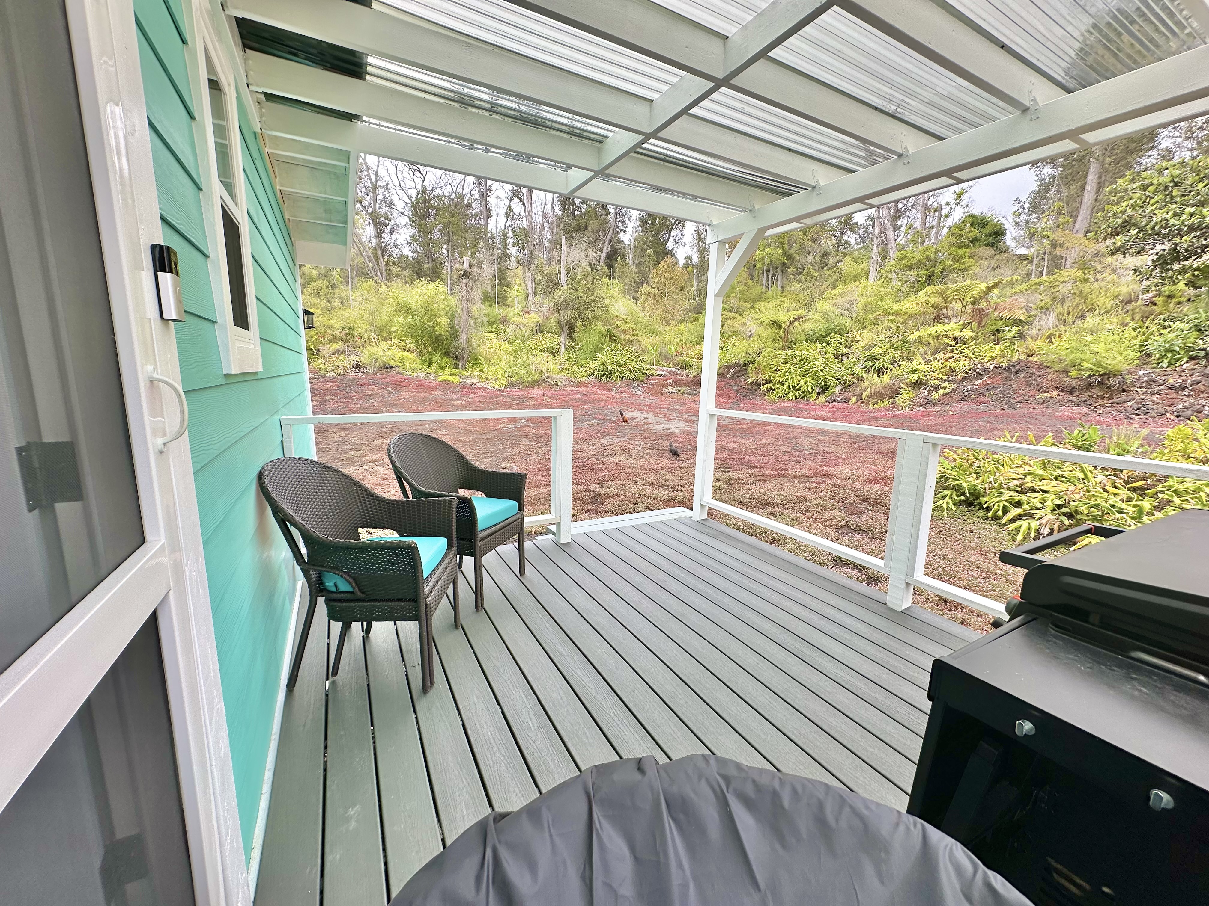 92-2083 Kailua Boulevard Ocean View, HI 96704 - Photo 21 of 30 a outdoor view with a sitting space