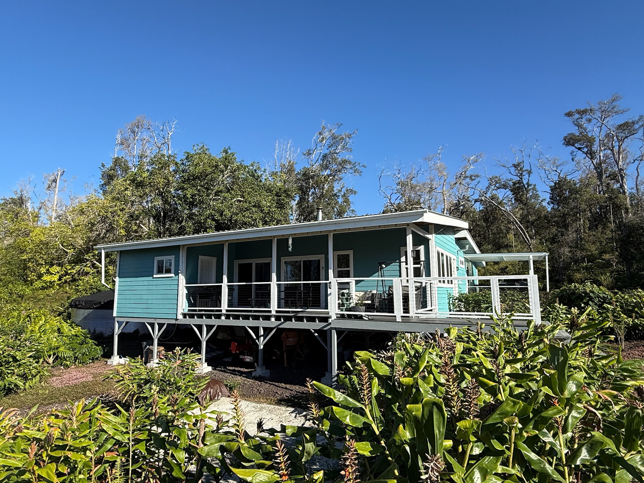 92-2083 Kailua Boulevard Ocean View, HI 96704 - Photo 29 of 30 a front view of a house with a yard