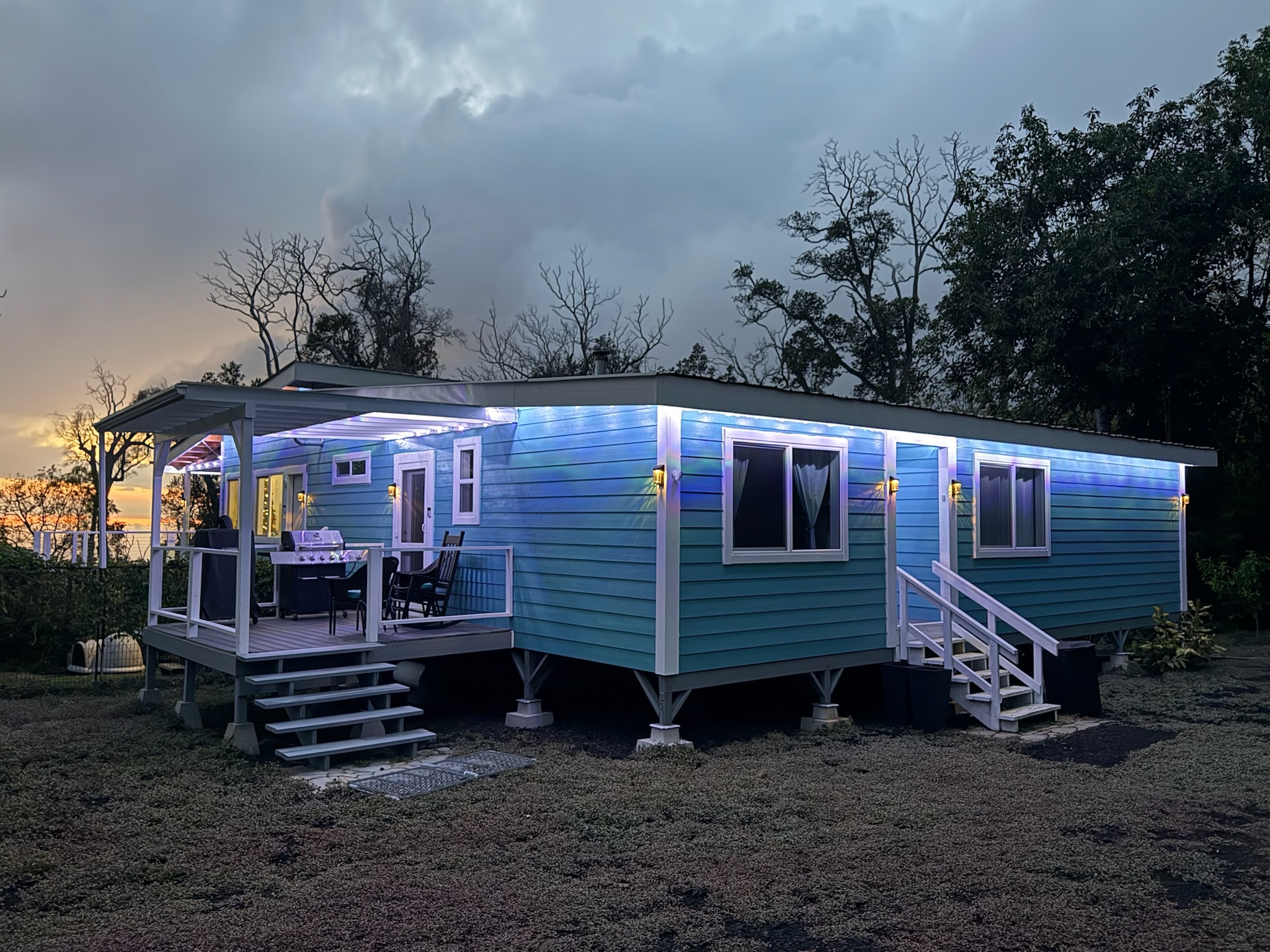 92-2083 Kailua Boulevard Ocean View, HI 96704 - Photo 30 of 30 a front view of a house with a yard