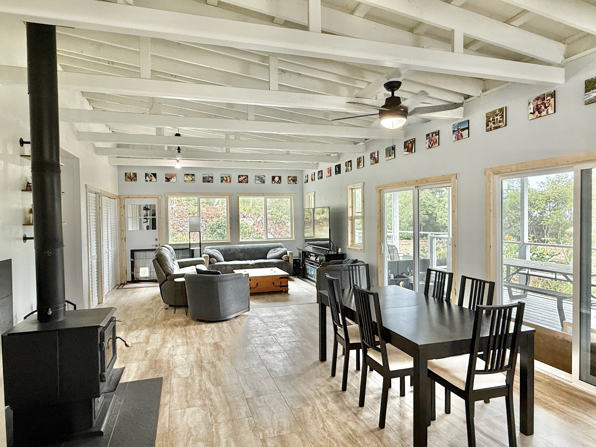 92-2083 Kailua Boulevard Ocean View, HI 96704 - Photo 4 of 30 a view of a dining room with furniture and chandelier