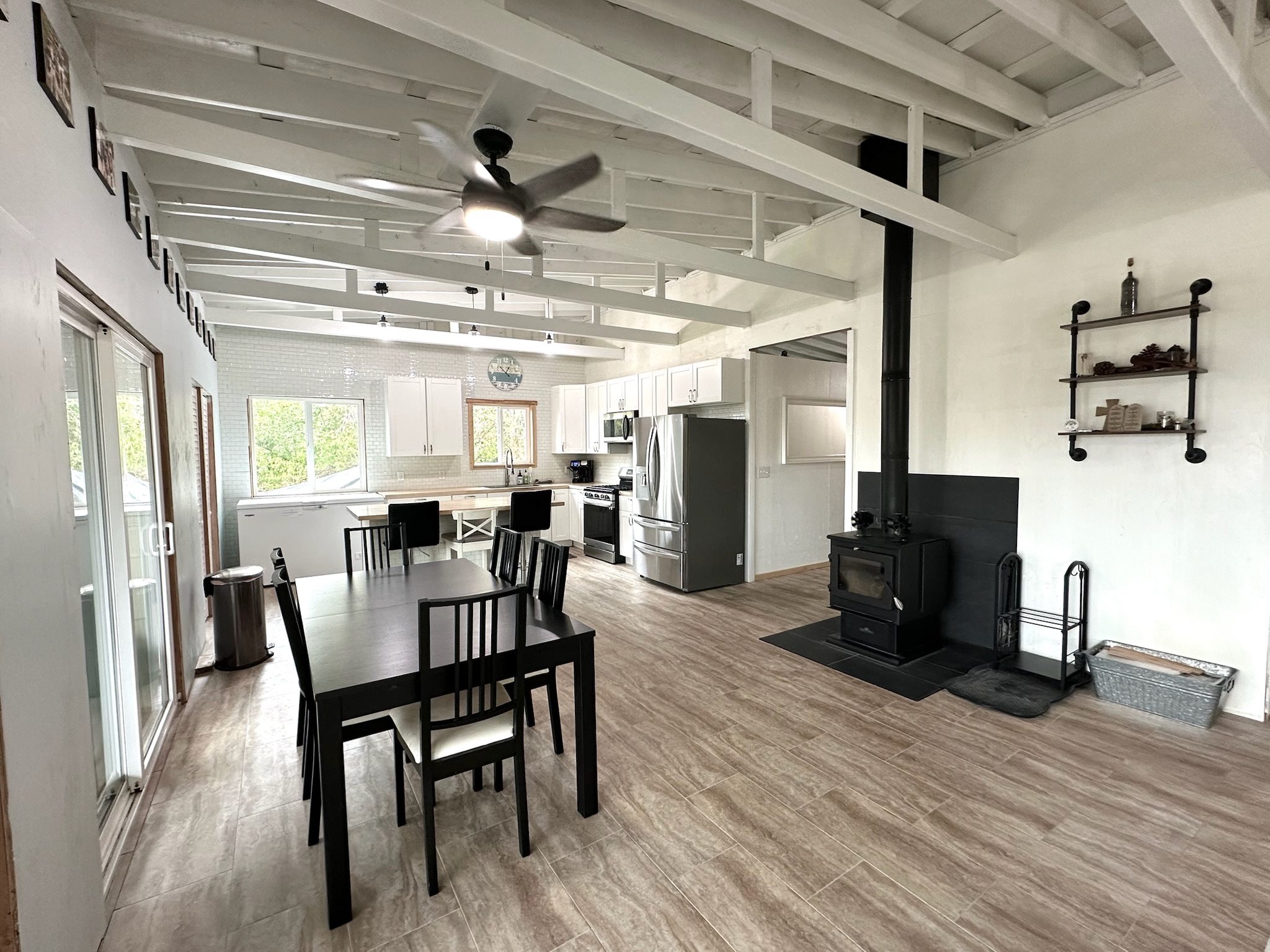 92-2083 Kailua Boulevard Ocean View, HI 96704 - Photo 5 of 30 a view of a dining room with furniture