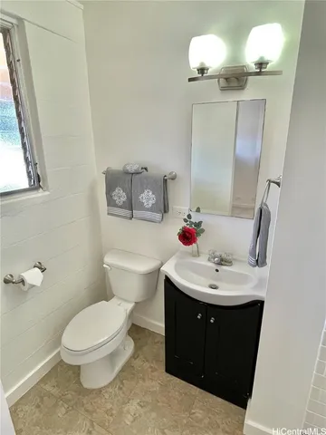 a bathroom with a sink a mirror and shower