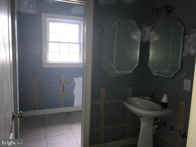 946 South Spring Road Vineland, NJ 08361 - Photo 12 of 19 Half bathroom and laundry room