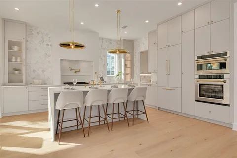 a spacious bedroom with a bed and a shower