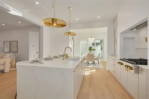 a living room with a bed furniture and a window
