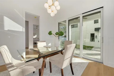 a bedroom with bed and a window