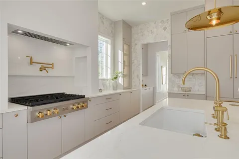a white bath tub sitting in a bathroom
