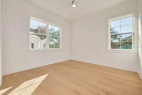 a view of multiple houses with city view