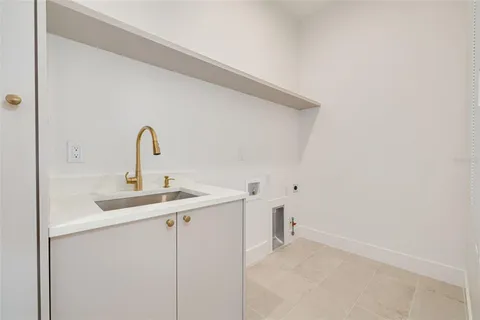 a picture of a bathroom with a bathtub