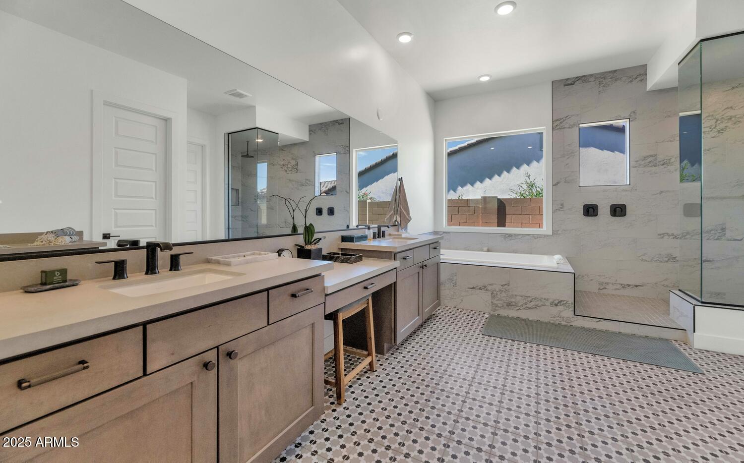2041 East Fallen Leaf Lane Phoenix, AZ 85024 - Photo 14 of 31 a bathroom with a sink a toilet a mirror and shower
