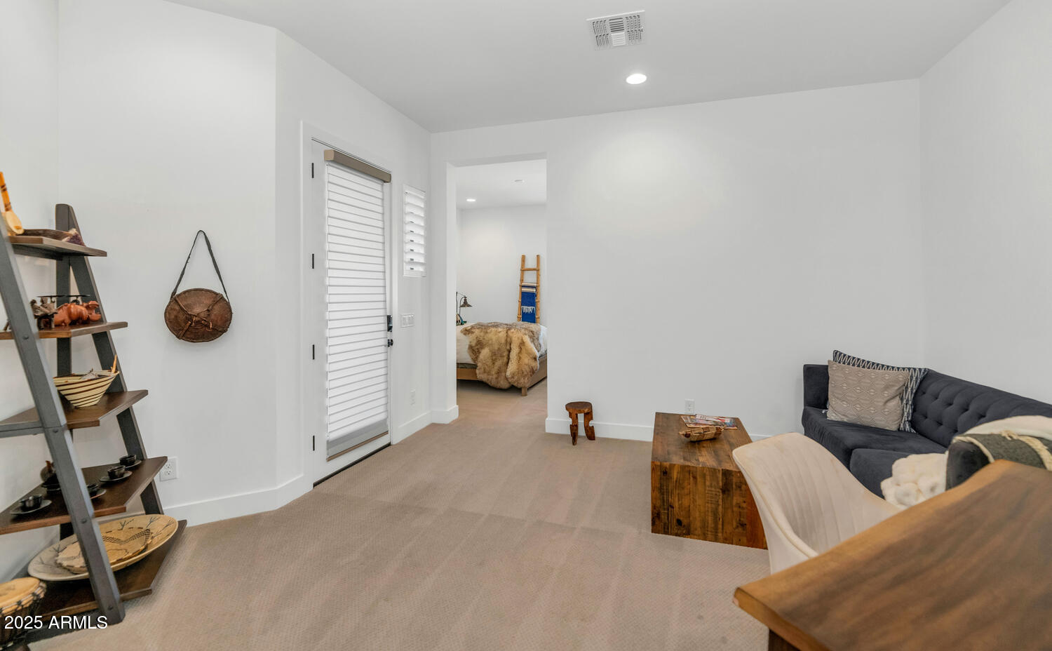 2041 East Fallen Leaf Lane Phoenix, AZ 85024 - Photo 16 of 31 a living room with furniture and a flat screen tv
