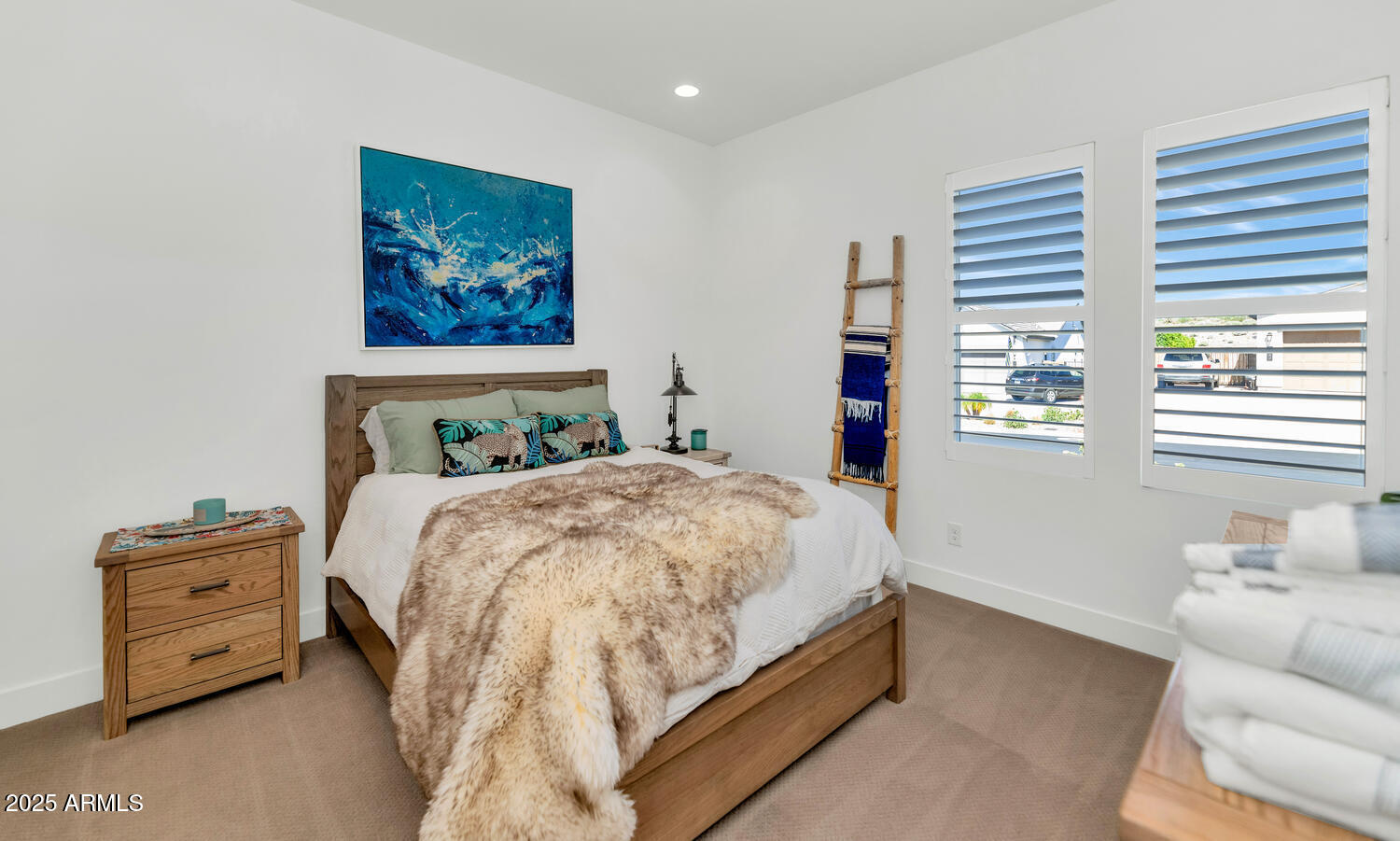 2041 East Fallen Leaf Lane Phoenix, AZ 85024 - Photo 18 of 31 a bedroom with a bed and a couch