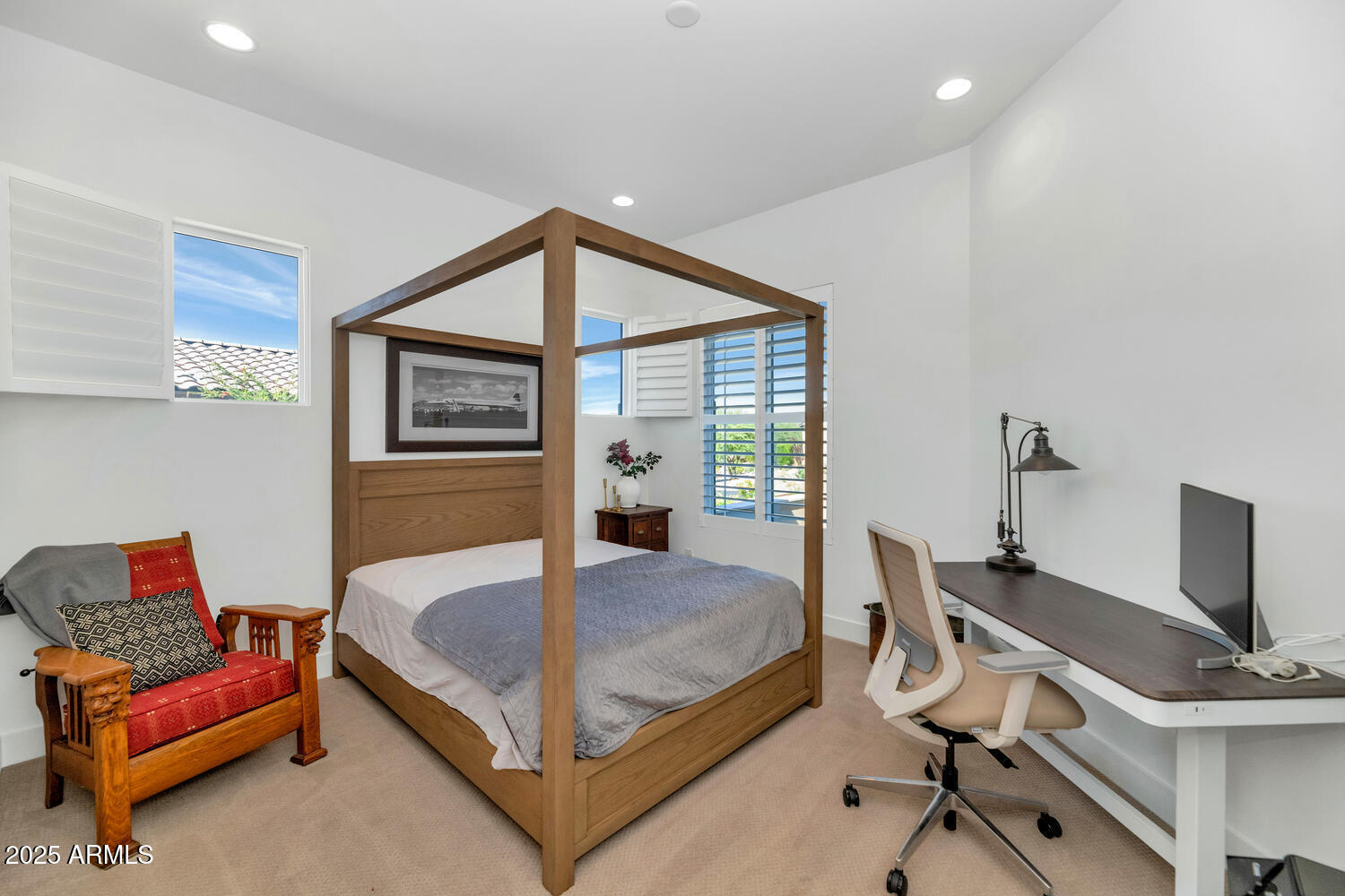 2041 East Fallen Leaf Lane Phoenix, AZ 85024 - Photo 21 of 31 a bedroom with a bed and a desk
