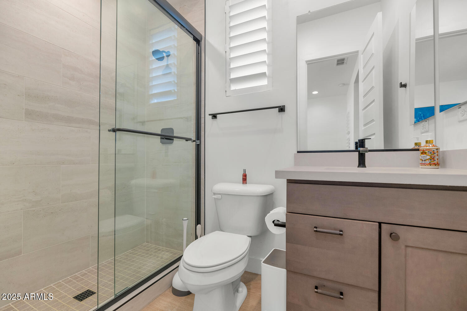 2041 East Fallen Leaf Lane Phoenix, AZ 85024 - Photo 22 of 31 a bathroom with a sink toilet and shower