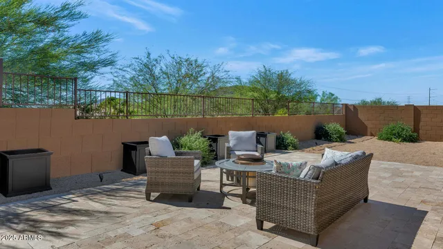 a outdoor living space with furniture and city view