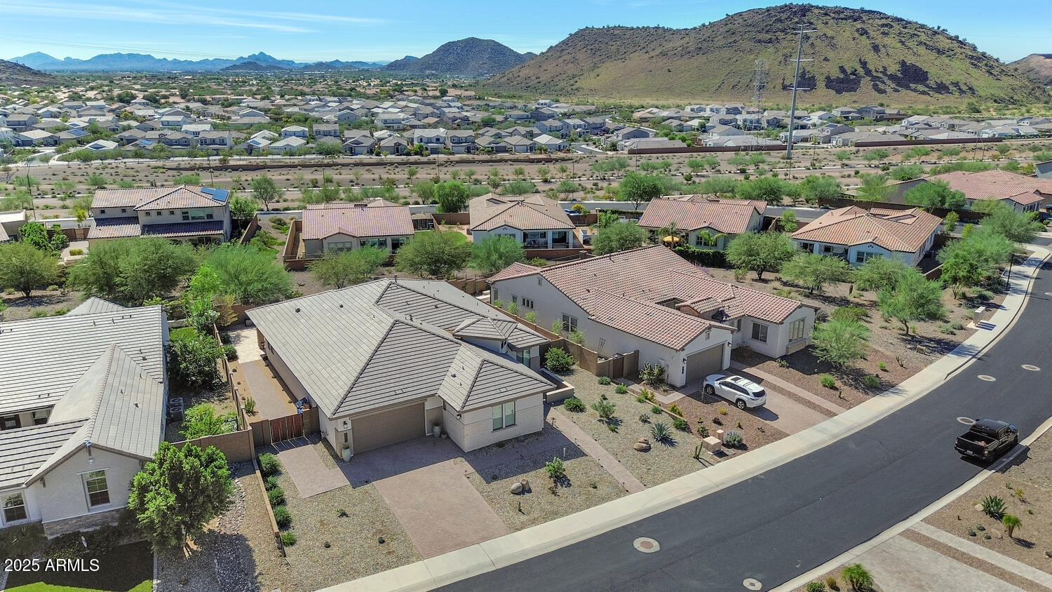 2041 East Fallen Leaf Lane Phoenix, AZ 85024 - Photo 27 of 31 an aerial view of a house with a mountain view