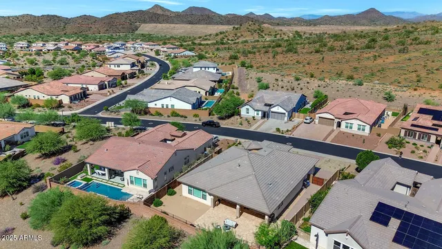 an aerial view of a city with lots of residential buildings