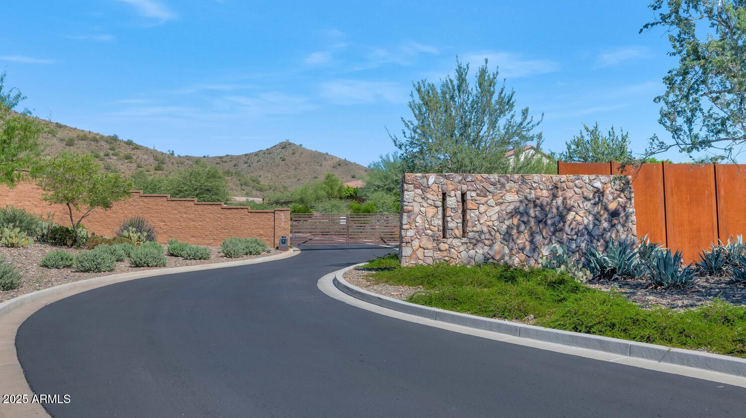 2041 East Fallen Leaf Lane Phoenix, AZ 85024 - Photo 31 of 31 a view of a street with a large trees