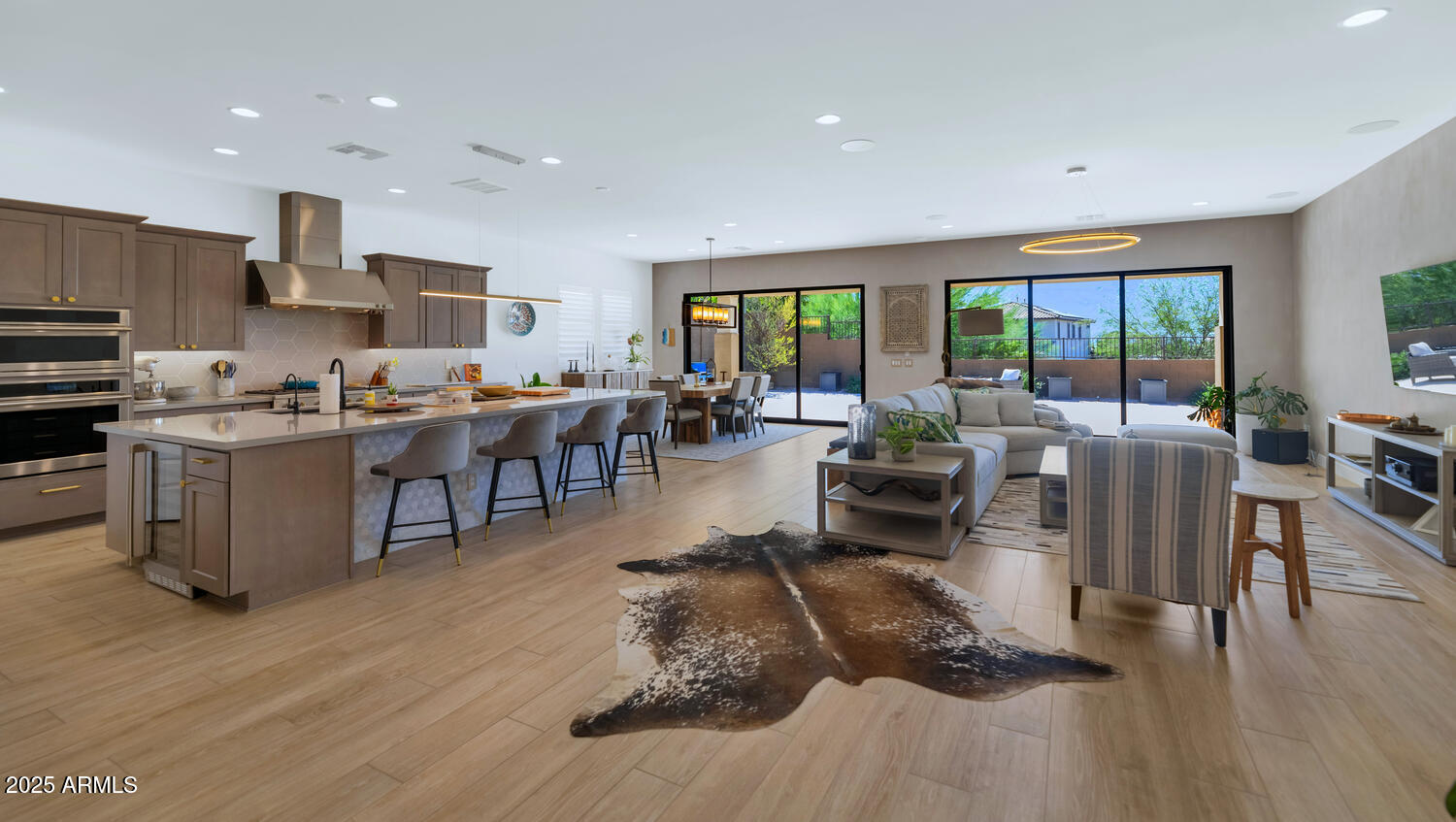 2041 East Fallen Leaf Lane Phoenix, AZ 85024 - Photo 4 of 31 a living room with lots of furniture and kitchen view