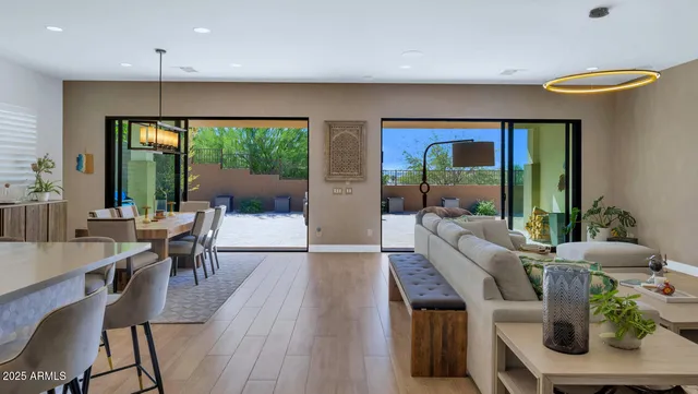 a view of a dining room with furniture window and outside view