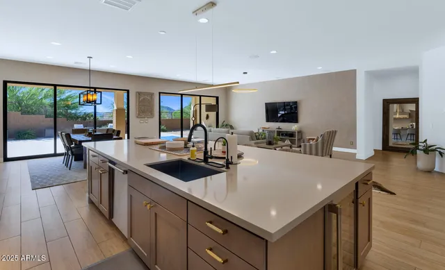a kitchen with a stove and a refrigerator