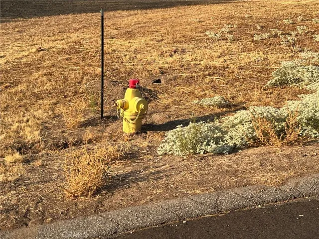 a view of a sign on a wooden bridge
