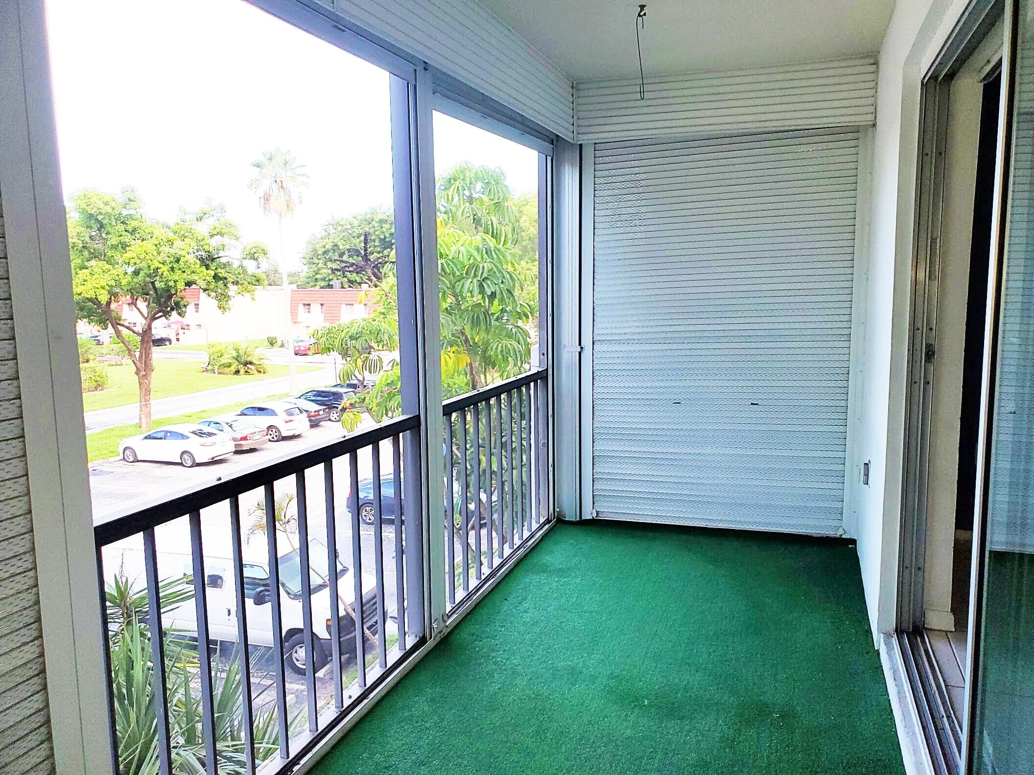 4156 Inverrary Drive, Unit 305 Lauderhill, FL 33319 - Photo 12 of 13 a view of a backyard with garden