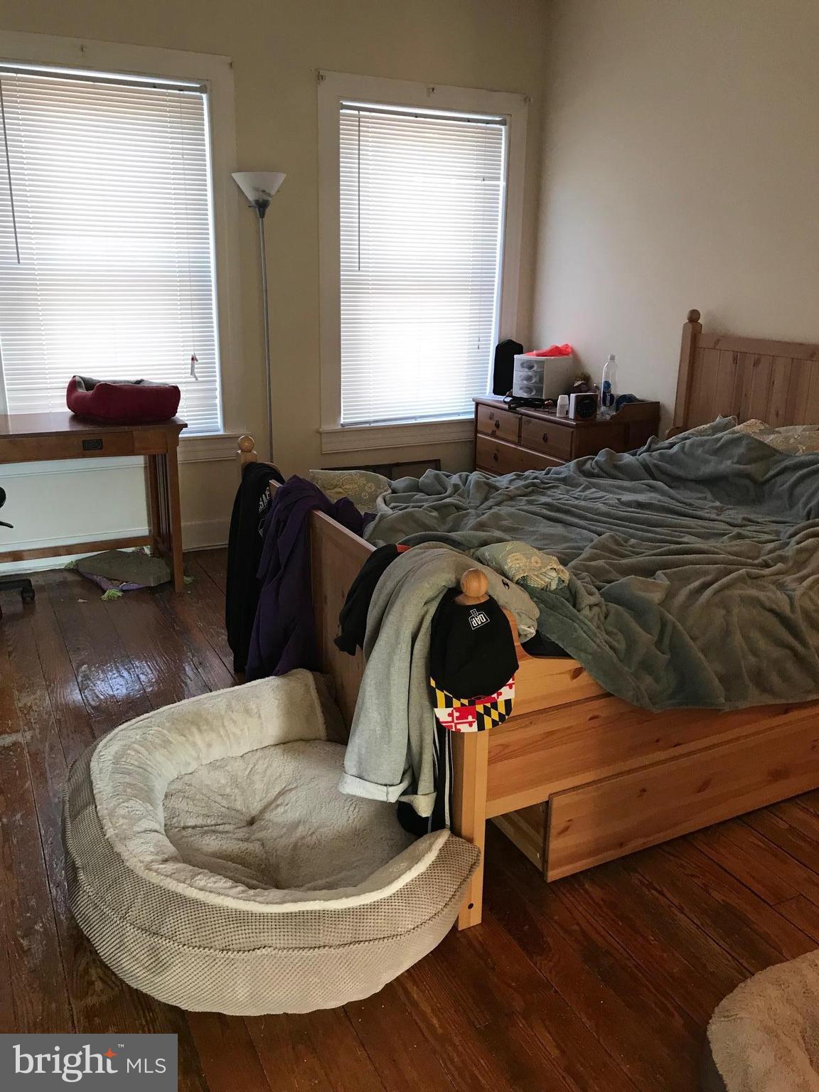 617 South Paca Street Baltimore, MD 21230 - Photo 17 of 25 Upper Level - Bedroom w/ Hardwood and Huge Windows