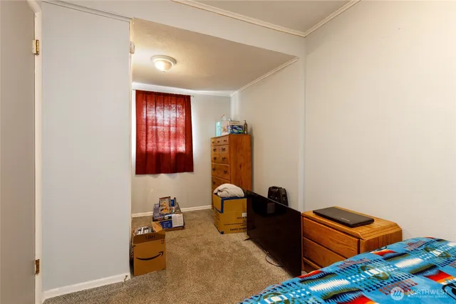 a room with furniture and a window