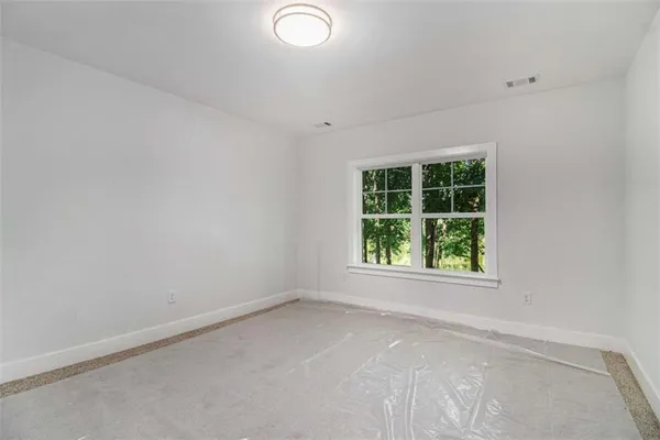 an empty room with a window