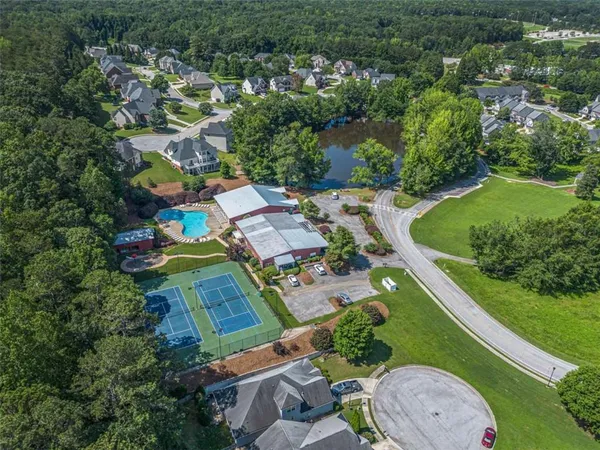 an aerial view of a house with a garden